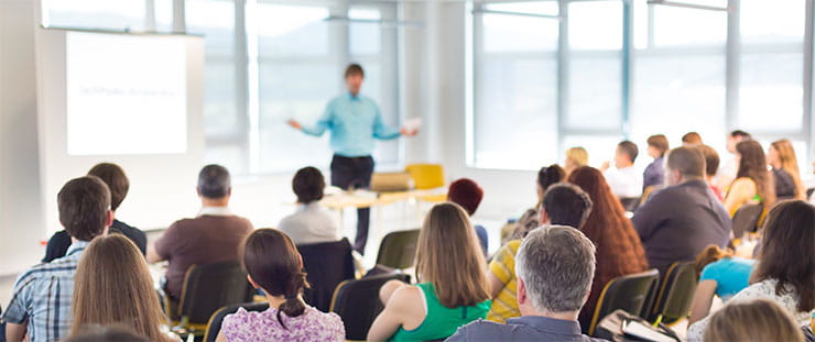 Seven basic classifications of forklifts: speaker lecturing a class